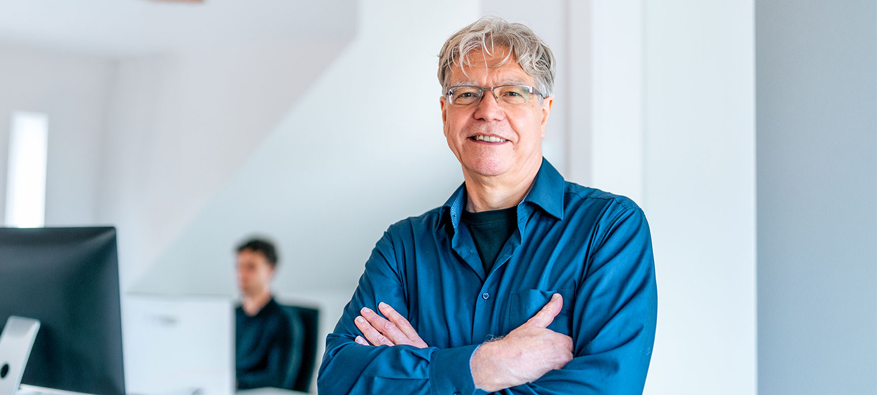 Mitarbeiter von AlphaTax in den Büroräumen des Unternehmens